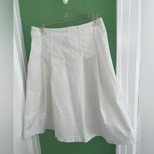 Knee length white skirt